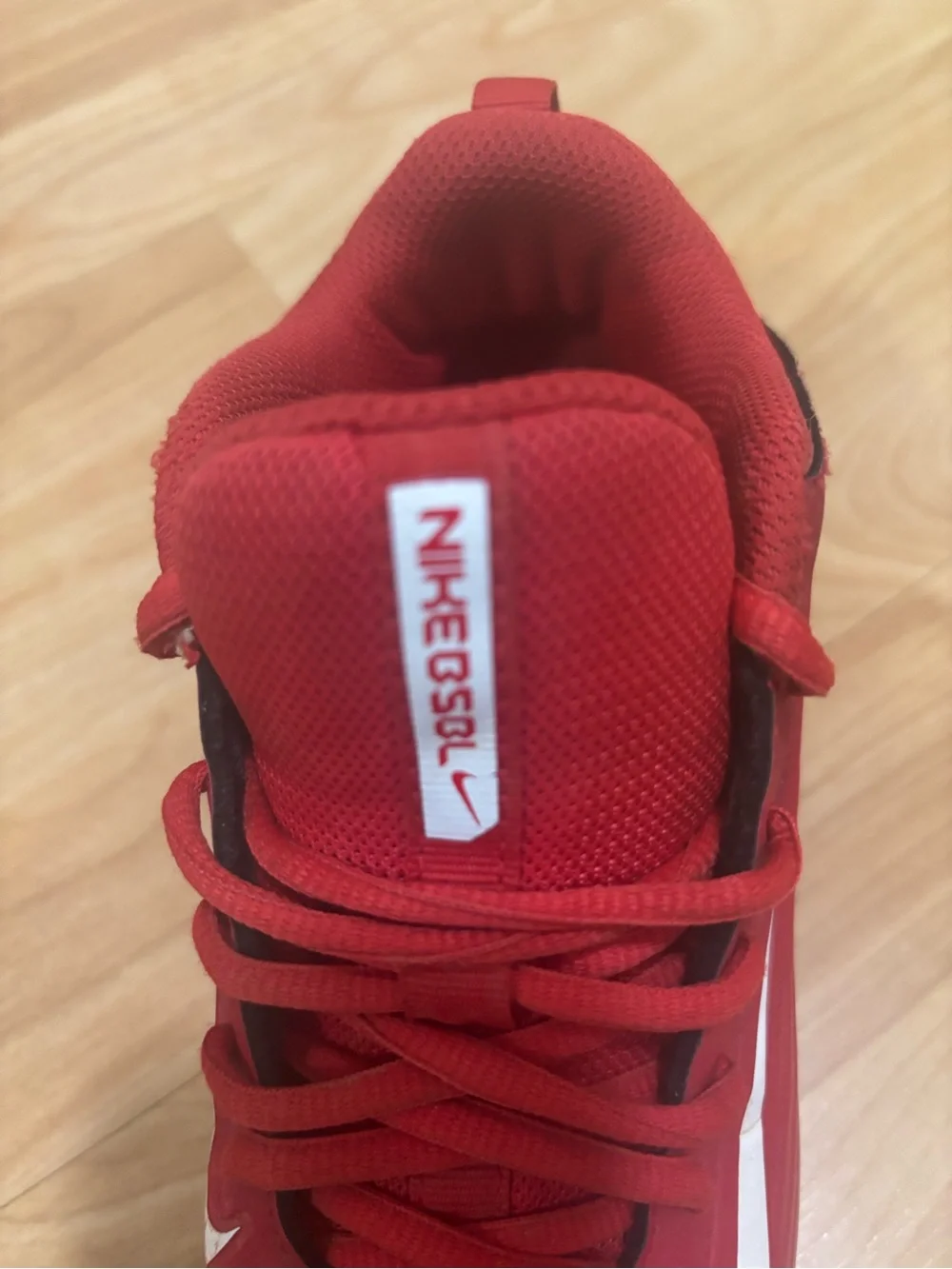 Nike Red Athletic Trainer with White Swoosh Accent Cleats